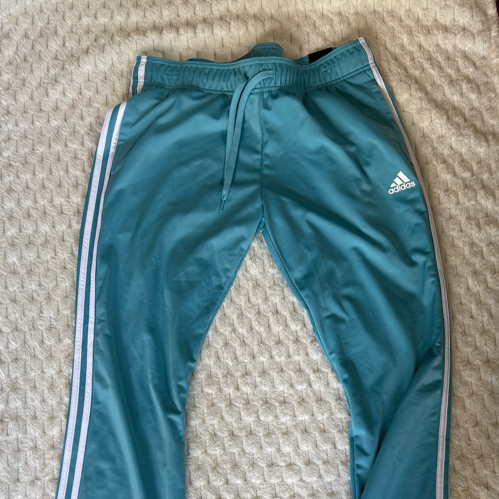 Woman’s Adidas lounge pants. Size large light blue NWT
